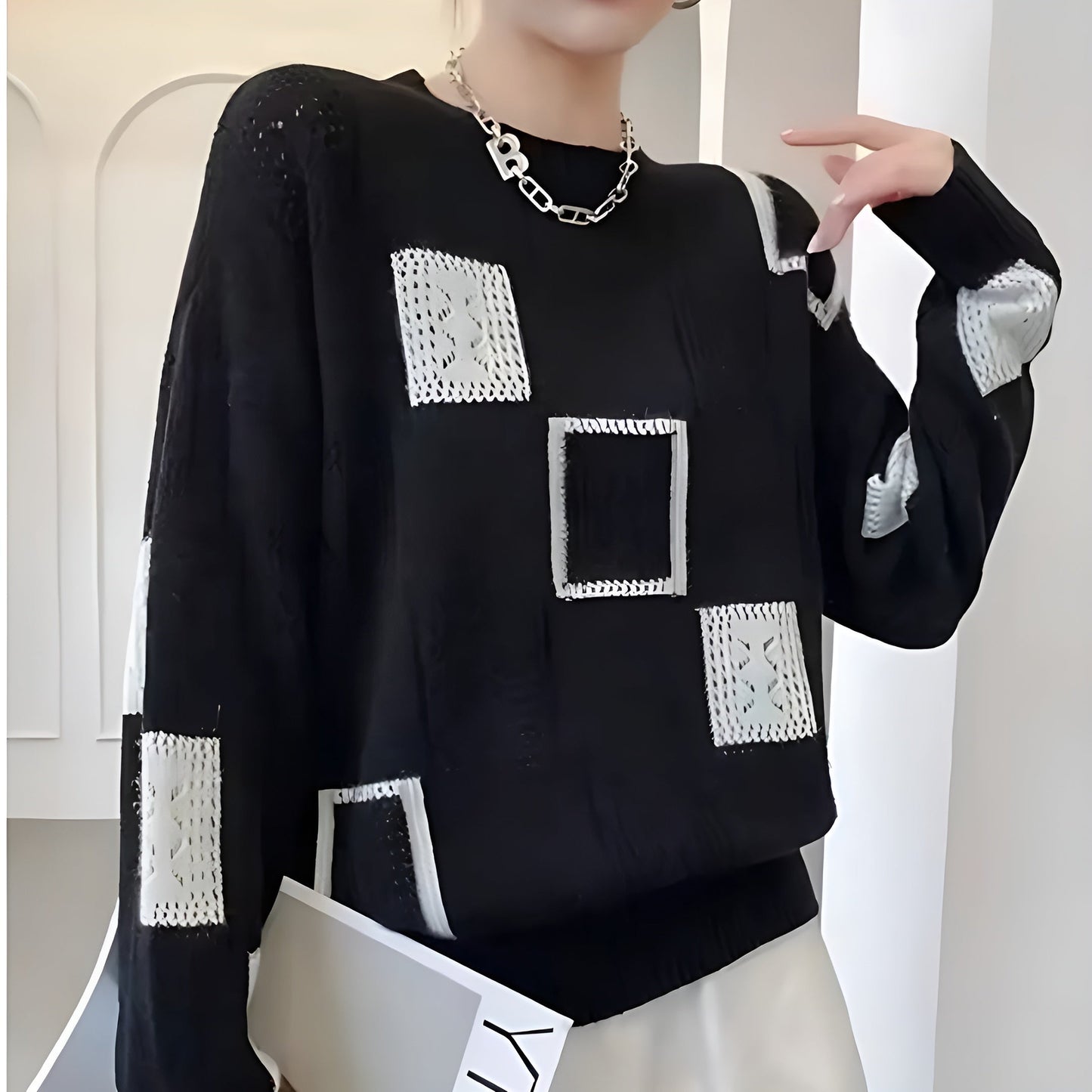 Avora Lyon | Pull Élégant à Motifs Géométriques Ajourés